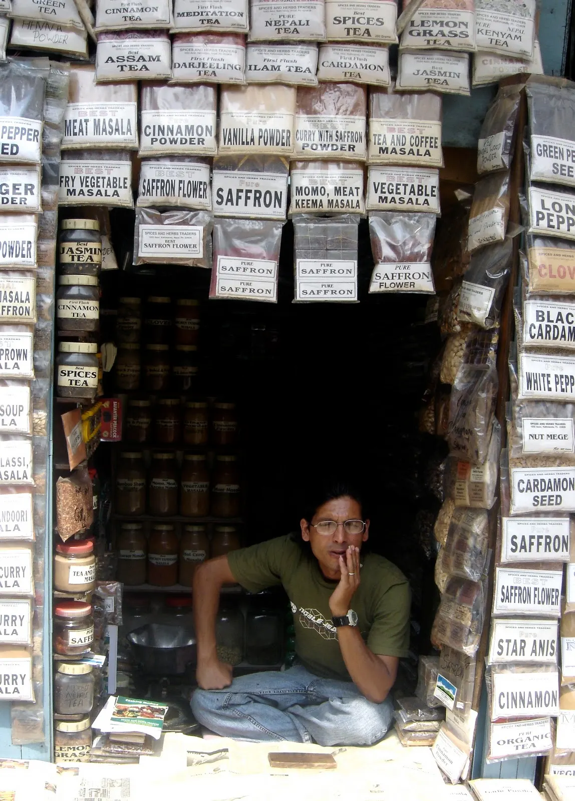 Shopping at spice market at Ason Tole area, Kathmandu which offers exotic packaged spice blends, ground and whole spices, momo spices (bite-size dumpling filled with meat or vegetables), and Nepali garam masala mixture.
