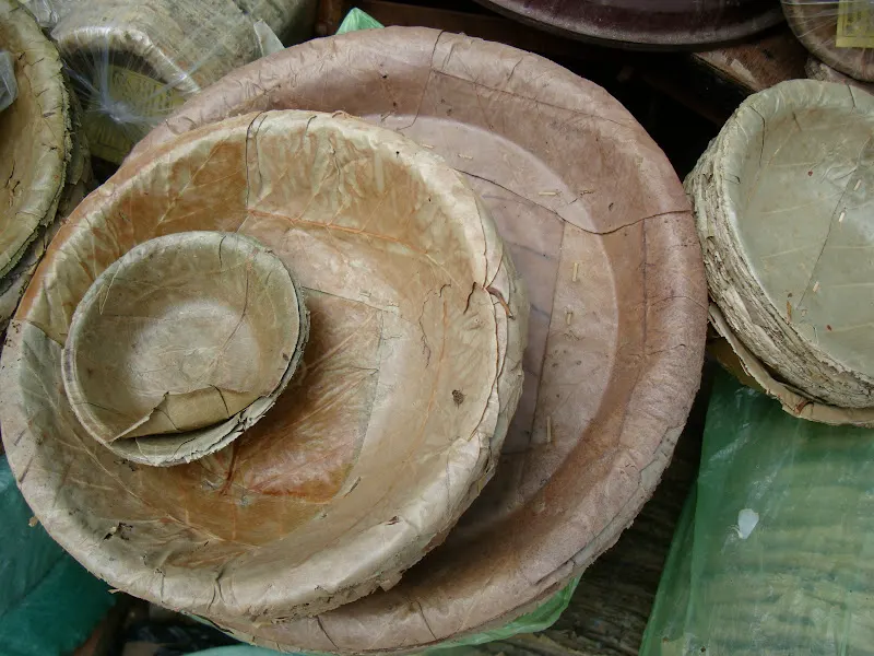 Three sizes of machine-made tapari plates - the large ones are used for dinner or lunch, the medium-size are used for snacks, and the small bowls are used for semi-liquid foods items, warm or cold.
