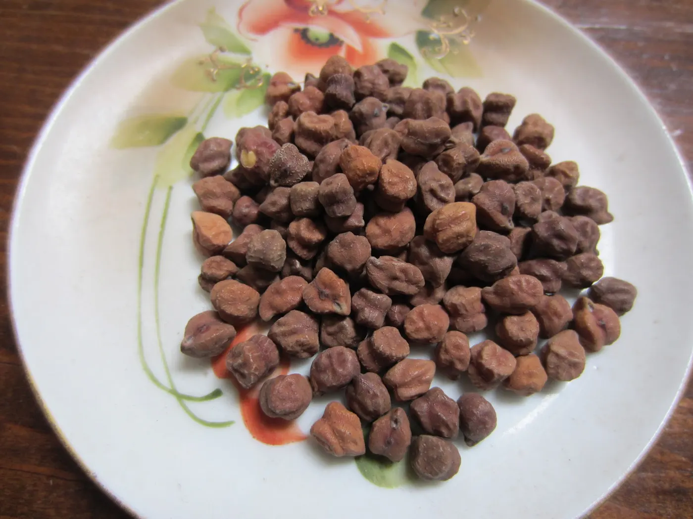 Dried Whole Bengal Gram with dark reddish-brown skins - Kaalo Chana