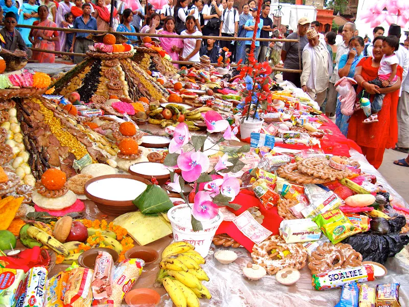 Close up view of Samay Baji displayed in front of Taleju Bhawani Temple in Kathmandu. People are celebrating and enjoying the annual festival.