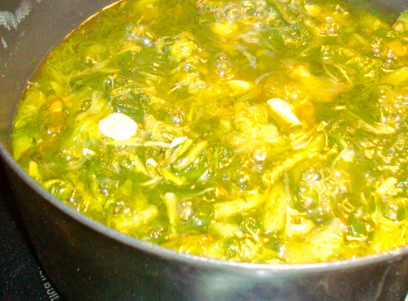 Preparing into a vegetable stew dish called "Karkalo ra Gaaba ko Tarkaari"