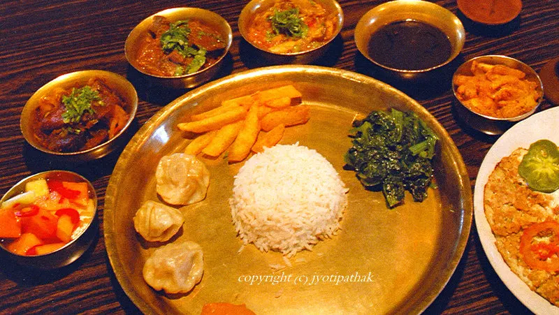 Here is a picture of "Tempered Kaalo Maas ko Daal' is served at Tukuche Thakali Kitchen near Durbar Marg, Kathmandu, Nepal
