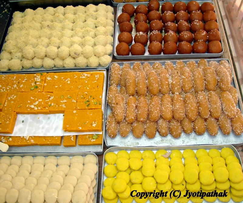 A large selection of assorted Nepali sweets displayed at the local sweet shop - looks absolutely delicious!