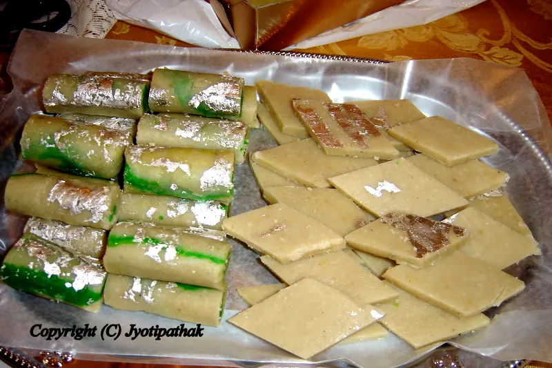 Home-made Cashew sweets - pictured (L) Cashew Rolls (made from pure ground cashews with pistachio filling) and (R) Kaaju Katri (diamond shaped, wafer-thin sliced, pure cashew sweets).