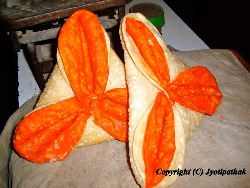 Chimti - (चिम्टी) - flower shaped flaky bread especially made during Dashai, Tihar-Bhai-Tika, and other religious festivals.