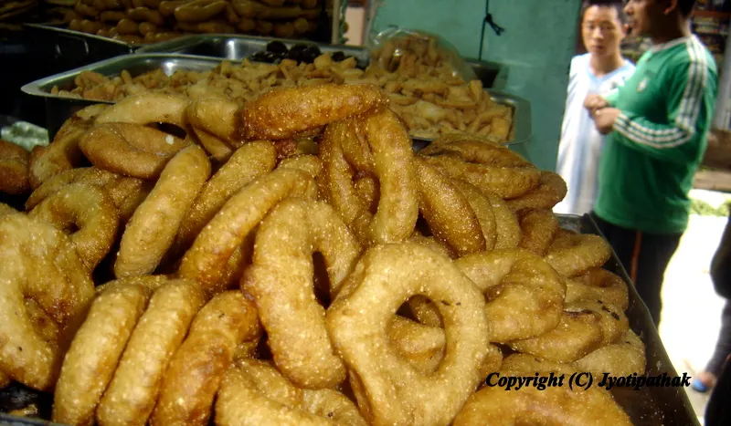 Sel-Roti - (Rice Bread). To read more about sel-roti, please click this link.