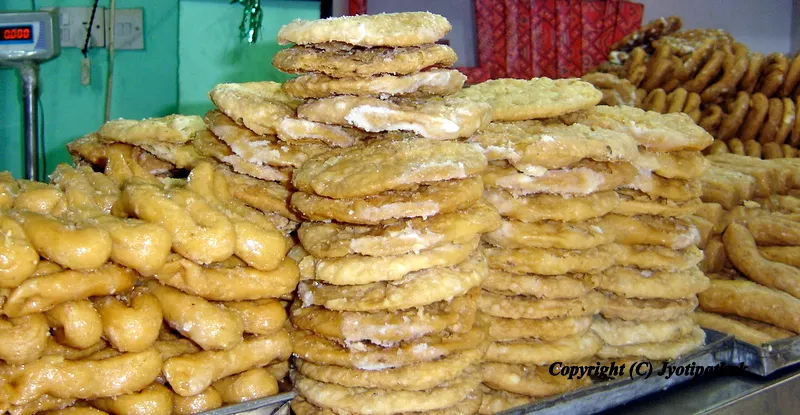 Images of traditional sweets - There are main five ingredients making these sweets - flour, clarified butter, sugar, water and oil for deep-frying.