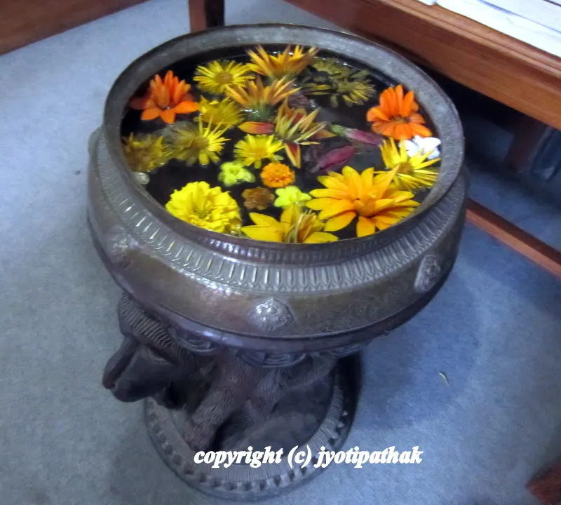 ...creative display with the flower of the season wishing everyday of the New Year glow with good cheer and happiness to you and your family!