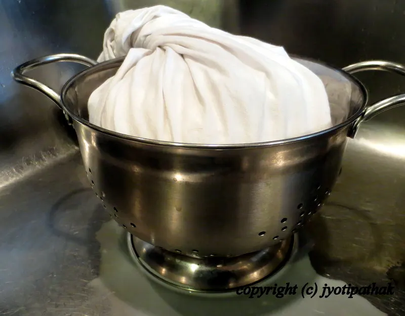 ... traditional way of straining yogurt through cheesecloth to remove the whey ...