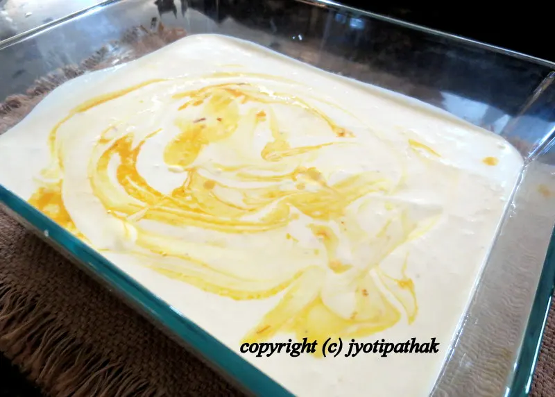 ... transfer into a serving dish and mix with saffron infused milk and chopped nuts
