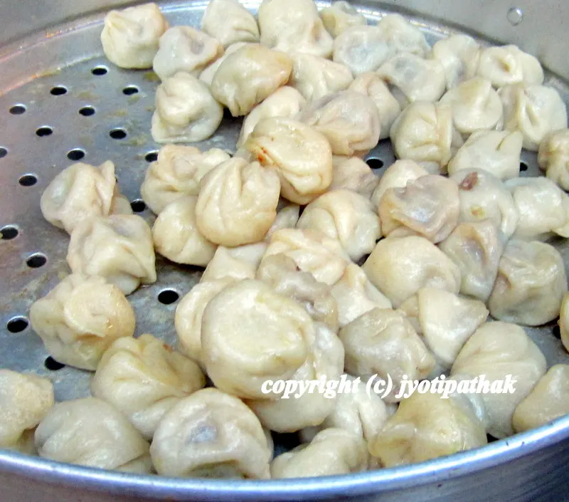Getting ready to be served - Do not over cook, or the momos will dry up, leaving the filling tasteless.