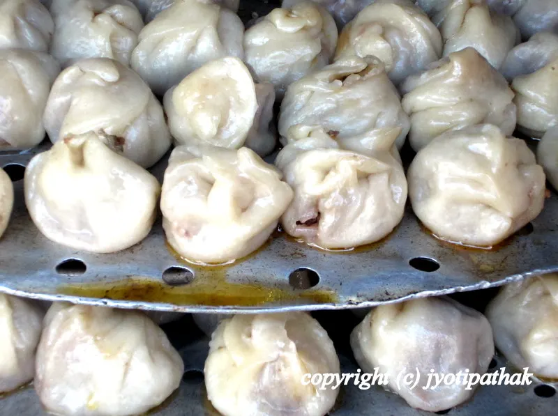 Freshly steamed momo brimming with savory juice