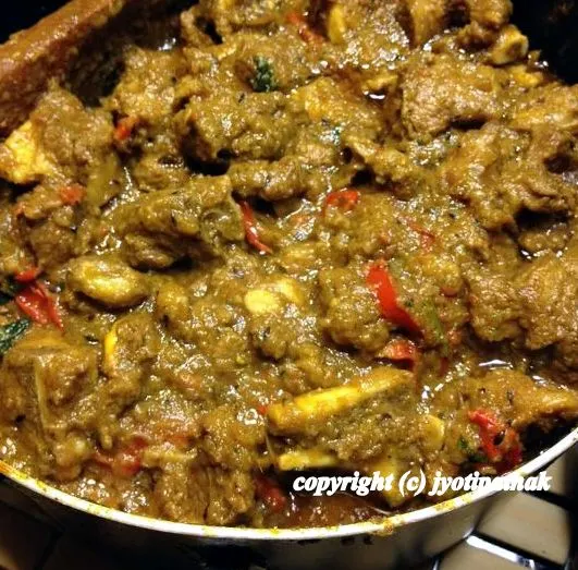 Another variation of goat curry - yogurt marinated tender young goat with the addition of onions, tomato, ginger, garlic and several other fresh herbs and spices added to make this delicious curry.