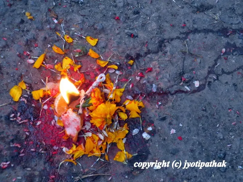 Highlight of vibrant and colorful city of Kathmandu - objects of worship in the middle of the streets