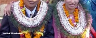 The ritual of Swayamvar ceremony during Nepali marriage. Swayamver is a kind of engagement ceremony, where the bride and groom exchange a traditional grass garland, rings and take a blessing from the family.