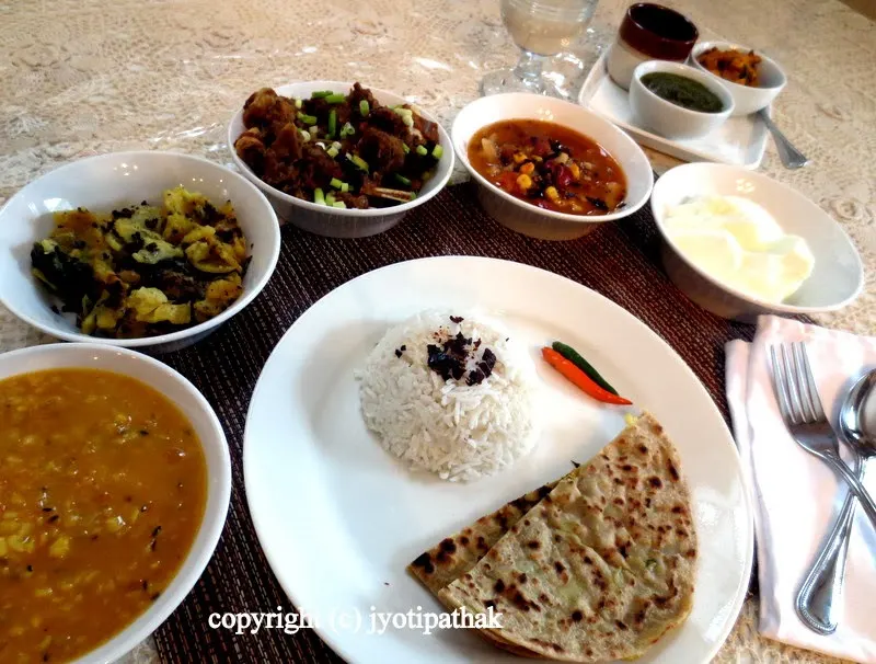... best home-cooked daal-bhaat-tarkaari... served with seasonal vegetables, rahar ko daal, goat curry and home-made refreshing yogurt.