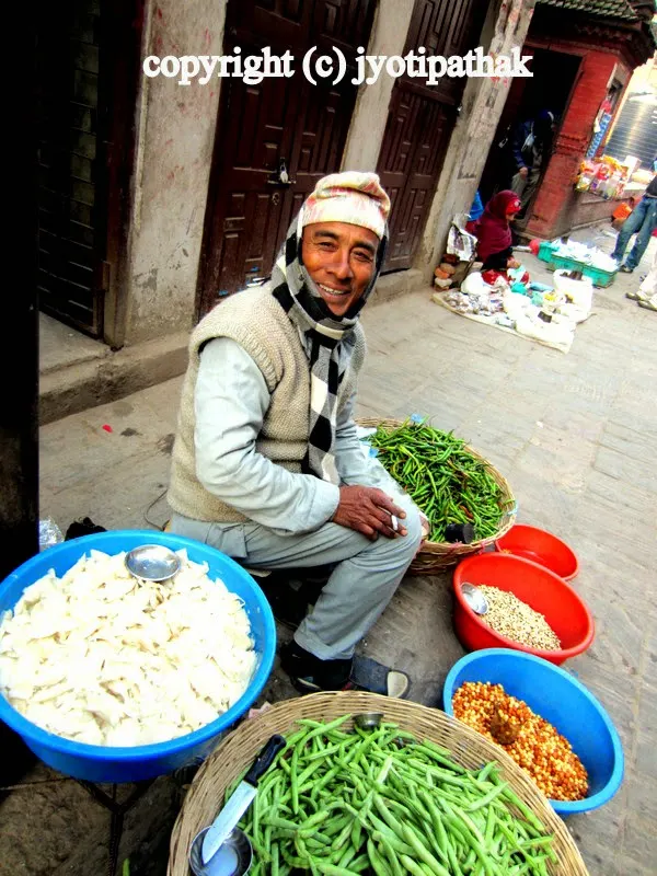 Nepali vegetable vendor selling freshly sliced bamboo shoots in the local markets