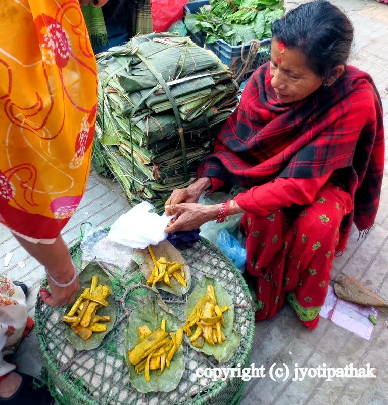 These tasty pickled bamboo shoots are for sale at a Nepali markets; they are a popular hard-to-resist condiment.....