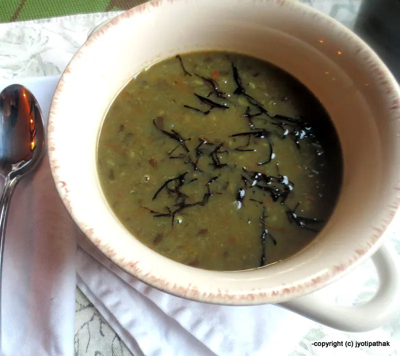Freshly cooked black lentil (maas ko daal) tempered with jimbu